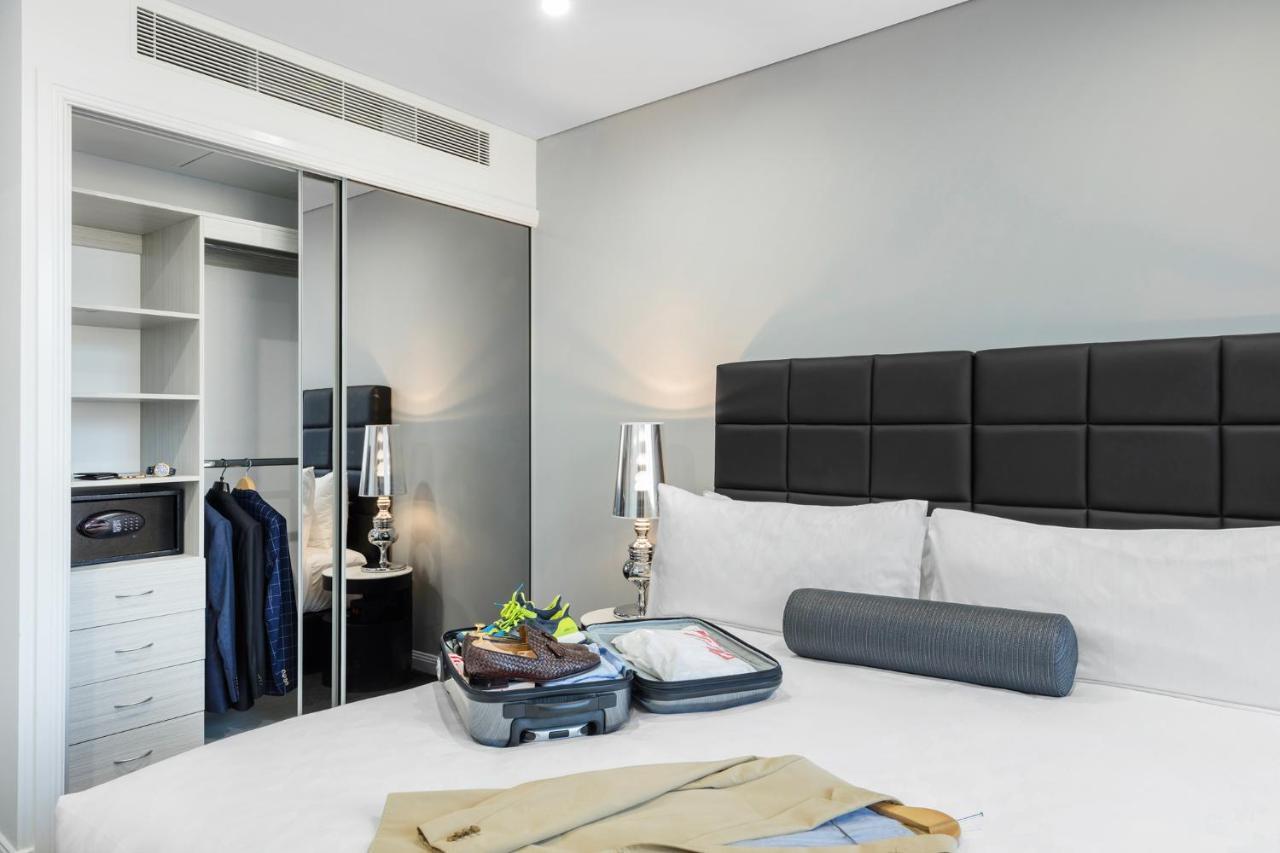 Meriton Suites North Σίδνεϊ Εξωτερικό φωτογραφία A bedroom at the hotel